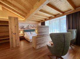 DOLOMITES B&B - Suites, Apartments and SPA，位于泰塞罗的酒店