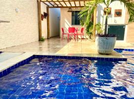 Linda Casa com piscina e totalmente climatizada Airbn b，位于彼得罗利纳的乡村别墅