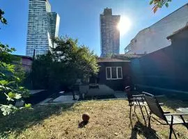 House with Natural Garden in the City Center