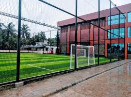 CAP SPORTS CENTER，位于Nīleshwar的酒店
