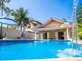 Casa com piscina em condomínio fechado em Bertioga，位于博拉塞亚的度假屋