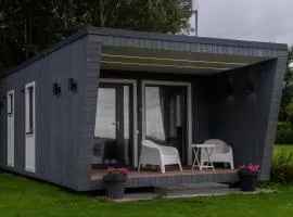 Tiny house aan het water op de appelhof
