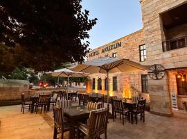 Akuzun Stone Hotel，位于于尔居普的酒店