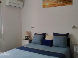 CHAMBRES Climatisées Confort,WIFI, GARE TGV,parking,pt dejeuner，位于佩皮尼昂的酒店