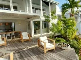 7 bedrooms Villa, Nestled in the heights of Anse Marcel, one of the most discreet bays of the island.