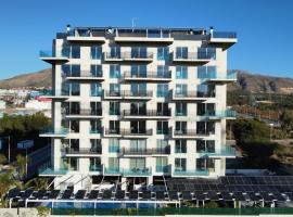 APARTAMENTOS OASIS DE LA CALA，位于菲内斯特拉特的酒店