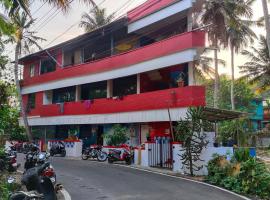 Abhi's cafe avaduthura kovalam，位于可瓦兰的酒店