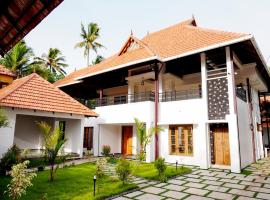 Kalloos Island Backwater Resort，位于奎隆的酒店