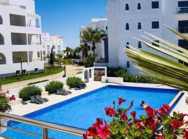 Apartamento en Residencia Jardines de Asilah，位于艾西拉的酒店
