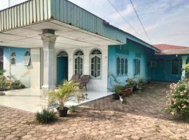 SPOT ON 93104 Barak Tambunan NearBelawan Port，位于棉兰的酒店