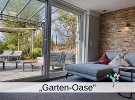 Terrassenwohnung Garten-Oase - Hochwertige Gartenwohnung mit Sonnenterrasse