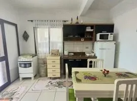 Apartamento térreo com garagem