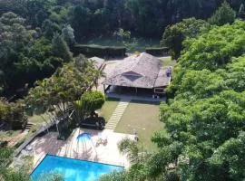 Casa Guacuri - Casa de temporada e eventos - apartamentos com suítes - Piscinas e Amplo Estacionamento