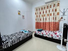 EMPIRE HOMESTAY PAKA ROOM 3，位于Paka的酒店