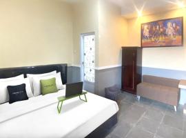 Urbanview Hotel Syariah House of Tuwuh by RedDoorz，位于Tanjungkarang的酒店