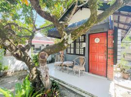 Dusun Indah Cottage 1，位于峇六拜的乡村别墅