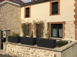 Agréable maison petit jardin à 7 minutes de Reims，位于Pargny-lès-Reims的酒店