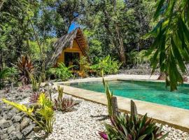 Cabinas de Lou Eco Lodge TAMARINDO，位于Santa Rosa的豪华帐篷