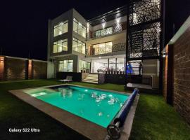 Casa Beily con alberca climatizada，位于阿特利斯科的酒店