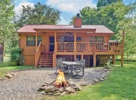 Riverfront Cabin with Hot Tub and Mountain Views!