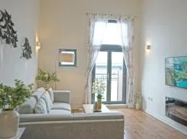 Soak up the Light at a Soothing, Stylish Apartment in Swansea Marina