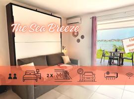 Le Sea-Breeze - Beau studio piscine VUE LAGON，位于马里戈特的酒店