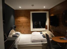 Fossheim Lodge - komfortabel minileilighet，位于Torset的木屋