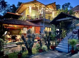 Coorg Sai Estate Ecobreeze Homestay，位于马迪凯里的住宿加早餐旅馆