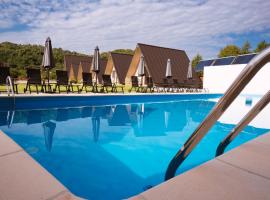 La Casute，位于Căpăţîneni-Pămînteni的酒店