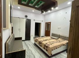 AB guest house { home stay}，位于比卡内尔的酒店