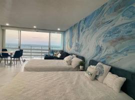 Beautiful Ocean Blue Love oceanfront apartment，位于法哈多的酒店