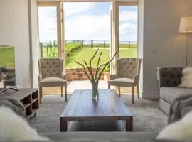 Butterwick - Barn Conversion with a hot tub on a Country Estate