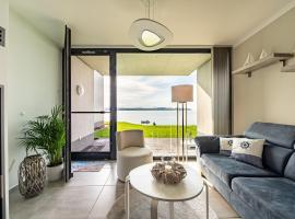 Traumblick Rügen- Gemütliches Apartment mit traumhaftem Meerblick, Kamin, privater Sauna und Schwimmbadnutzung，位于奥特里德维茨的酒店