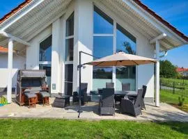 modernes Ferienhaus mit Kamin, Garten und eigener Sauna - Ferienhaus Meerfreude