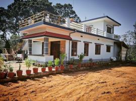 Coorg Teakwood Treasure Homestay，位于马迪凯里的酒店