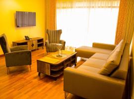 TJ's Boutique Hotel，位于埃尔多雷特的酒店