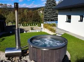 Domek Viking z prywatnym ogrzewanym basenem sauną oraz balią z jacuzzi
