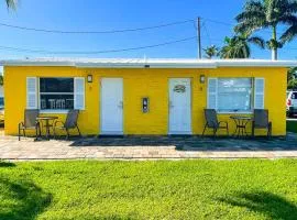 Poolside King Cottage with Kitchen - 10 Minutes to Beach!