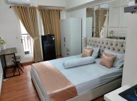 Apartement Podomoro golf view exit toll cimanggis，位于茂物的酒店