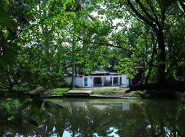 Ashtaman's Chayakadaveedu，位于奎隆的酒店