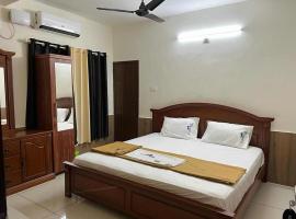 Vaishnavam Inn，位于古鲁瓦尤尔的酒店