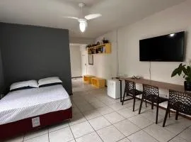 Quarto próximo à praia