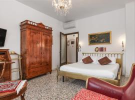 ANGOLO ALLA STAZIONE SUITE - Appartamento con terrazzo panoramico，位于帕维亚的酒店