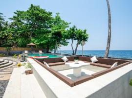 Bali Taoka Beach Villa，位于新加拉惹的旅馆