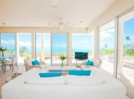 Aqua Del Rose 2 BR Beachfront Cottage