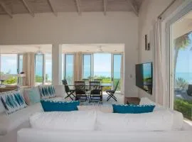 Aqua Del Rose 1 BR Beachfront Cottage