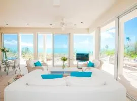 Aqua Del Rose 3 BR Beachfront Cottage