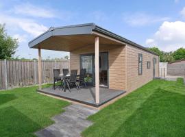 Chalet De Zonneschelp - Ouddorp，位于奥德多普的酒店