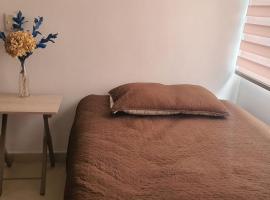 Habitación en apartamento compartido en Envigado，位于恩维加多的民宿