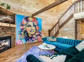 SmokiesBoutiqueCabins would love to host you at Dolly's Cute Cabin! 4 Suites with Private Bathrooms - Hot Tub, Fire Pit, Game Room, Resort Pool open Memorial Day through Labor Day!